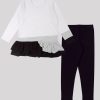 К-т асиметрична блуза и клин е комбинация от асиметрична блуза в три цвята - бял, бял меланж и черен с набран волан на талията плюс класически клин от меко трико в черен цвят, Момичета 2 - 10 години, Zinc