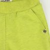 Панталон с дължина 7/8 с външни джобове в жълто-зелен меланж. Панталонът е с два странични италиански джоба и два големи джоба отстрани с капаци, които създават усещане за карго панталон, Момчета 2 - 10 години, Zinc (отпред, отблизо)